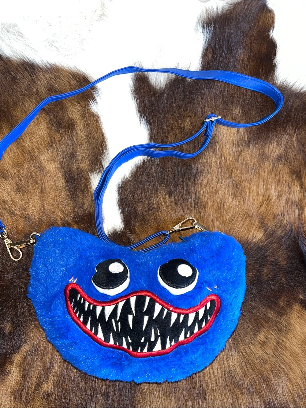 Huggy Wuggy cross body purse from the Poppy Playtime horror game.